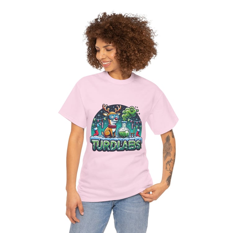 Joyful person in pink t-shirt featuring cartoon reindeer with vibrant TURDLABS design.