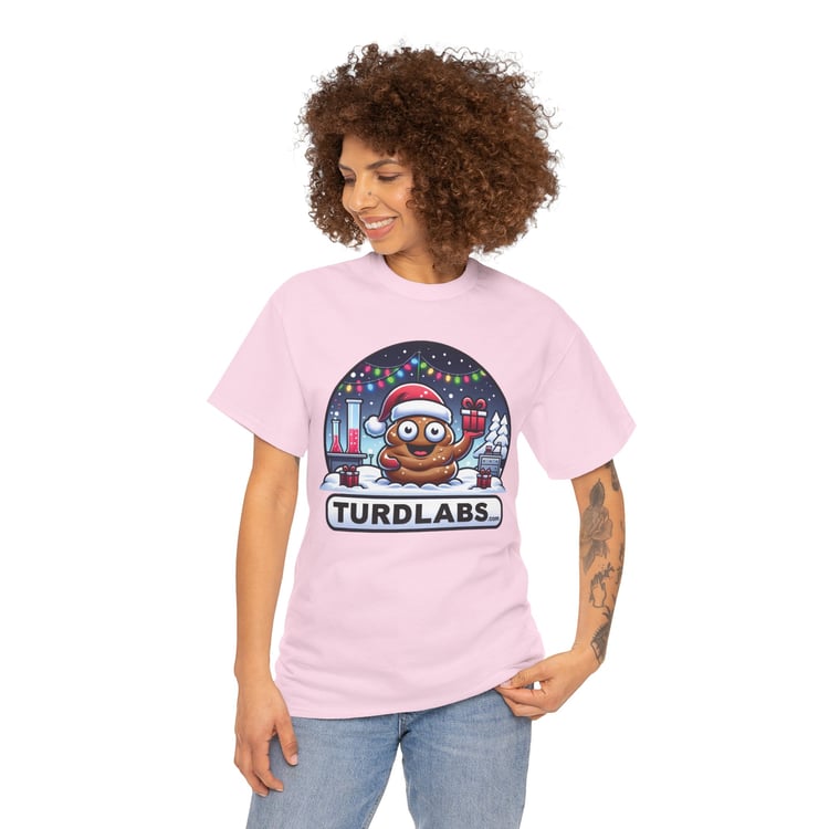 Woman in pink T-shirt with festive poop emoji design, lab theme, smiling confidently.