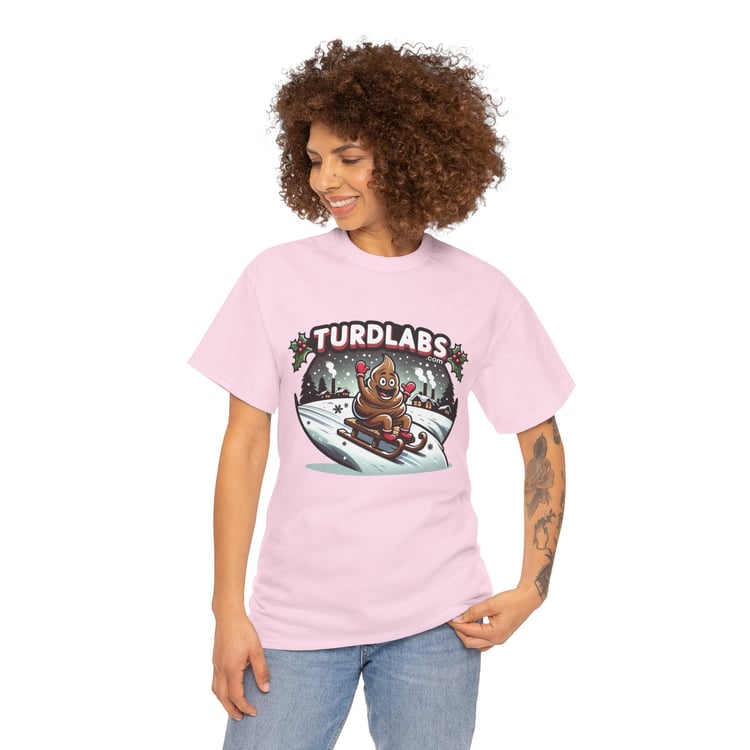 Festive pink T-shirt with winter poop emoji sledding; tattoos, snowy-scene, TURDLABS branding.