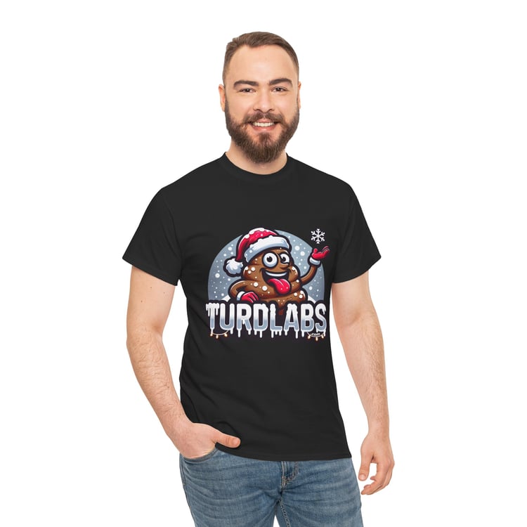 Smiling man wears T-shirt with festive poop emoji and Santa hat design.