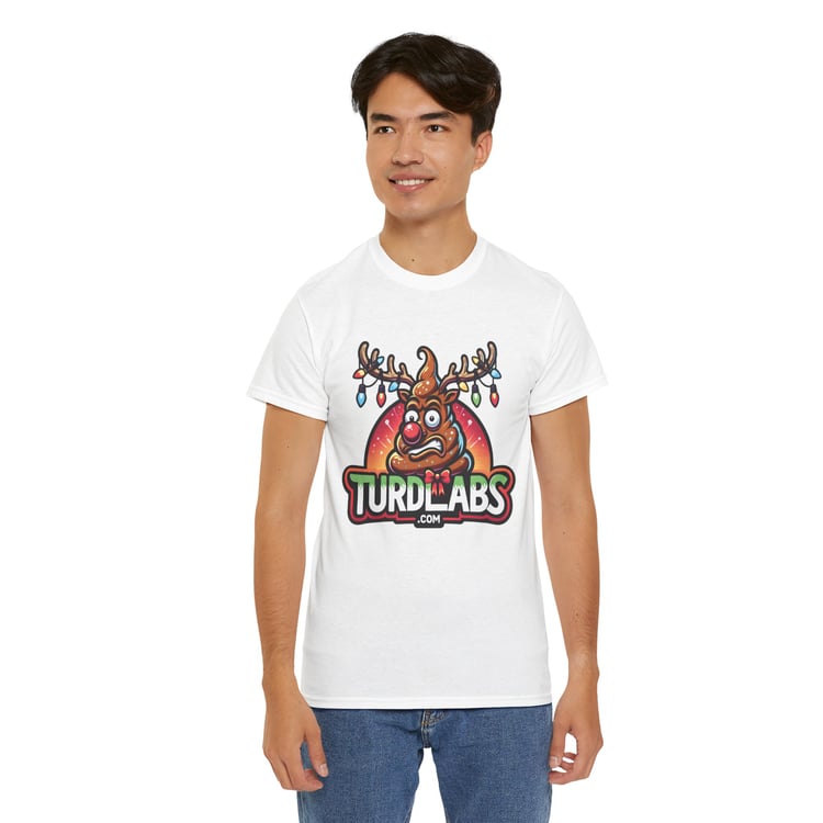 Young man wearing a TURD LABS reindeer t-shirt with festive lights against plain background.