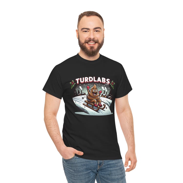 Man wearing humorous holiday poop emoji sledding t-shirt with festive TURDLABS design.