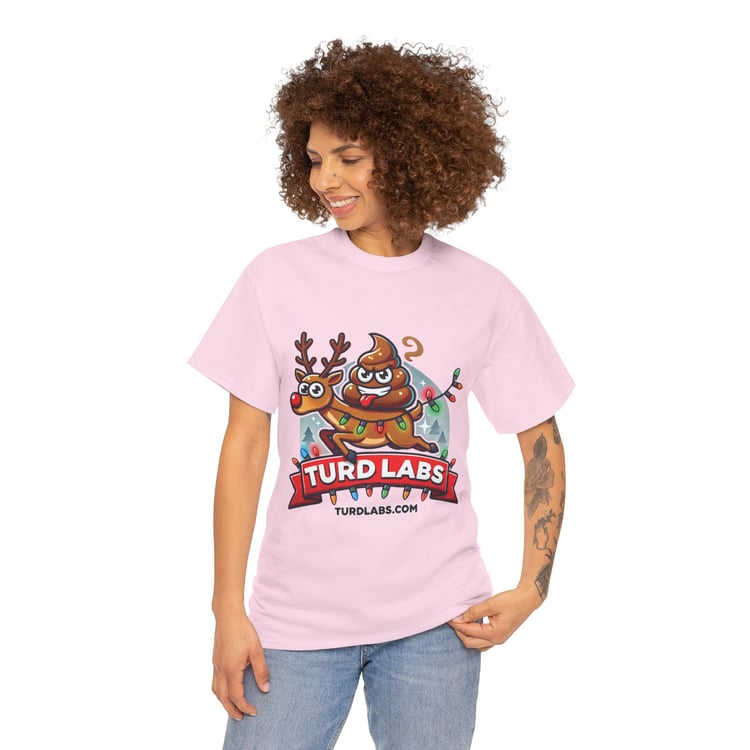 Light pink t-shirt with reindeer poop emoji design, TURD LABS branding, worn by smiling person.